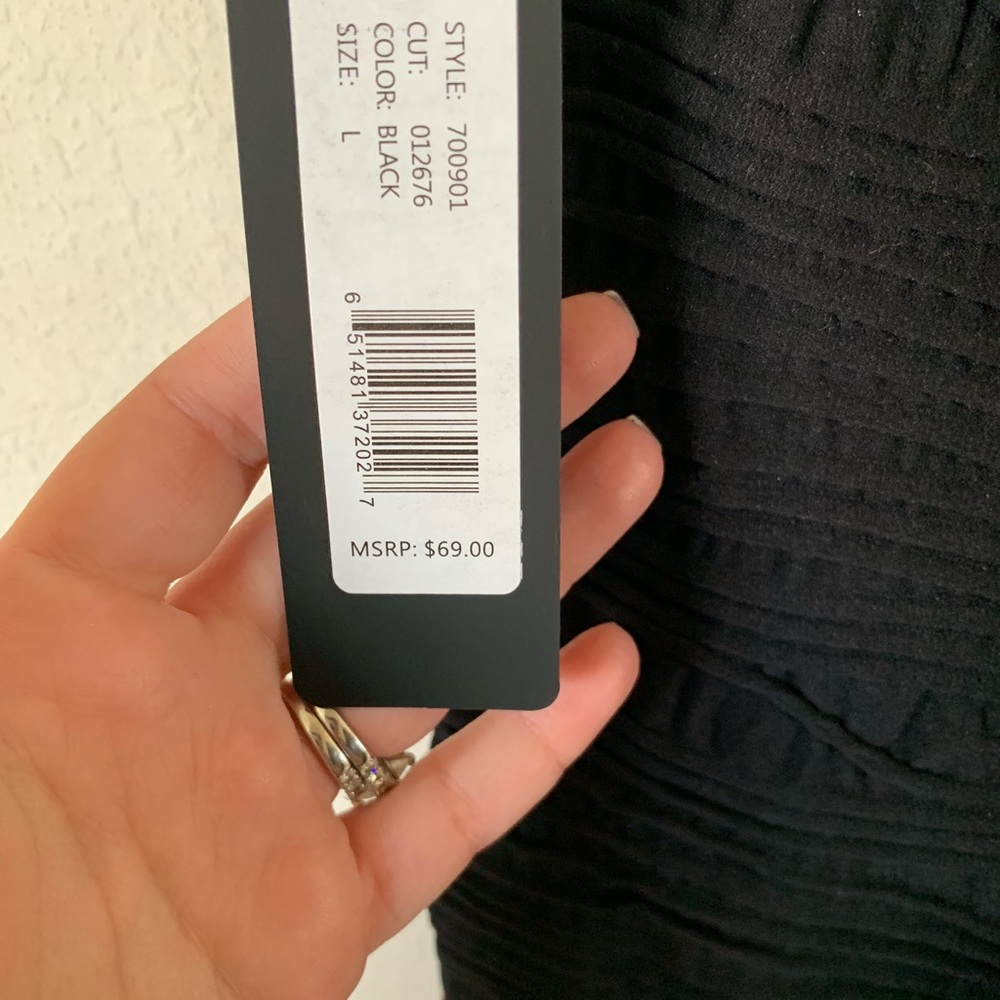 Stretch bodycon dress from BEBE. New with tags !